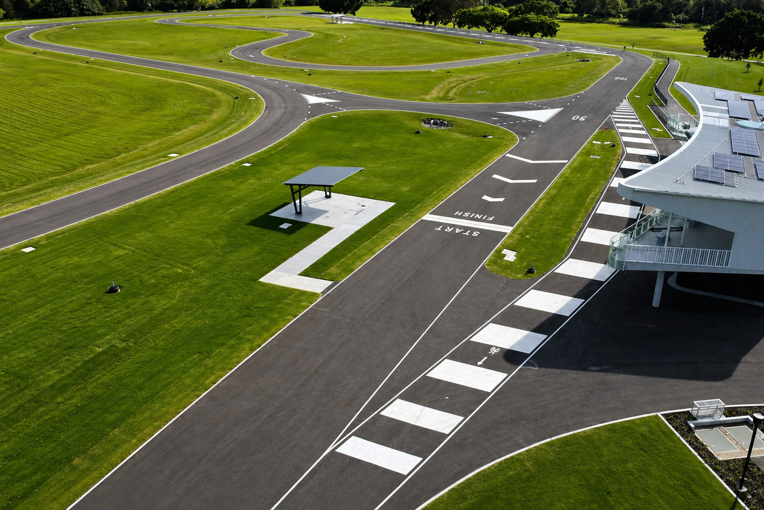 Driver training circuit with start/finish line and precision markings